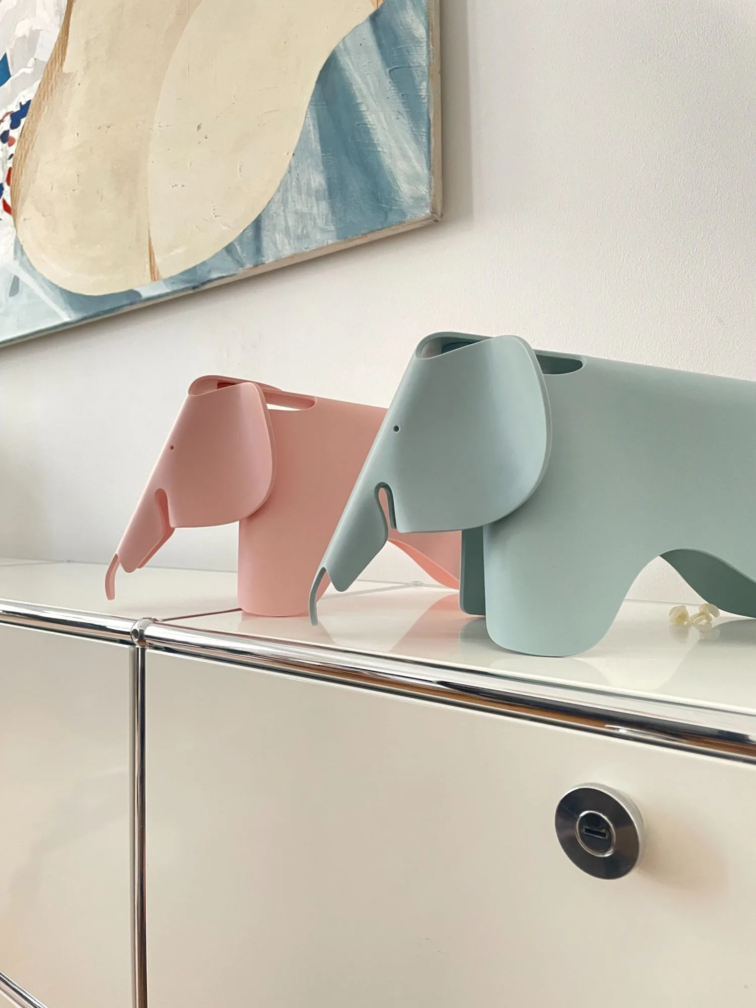 Two Eames elephants on a sideboard at Ku’damm Büro
